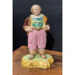 A Derby patch mark type figure, with nodding head, modelled as a portly gentleman, he stands