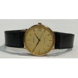 A gentleman's 9ct gold Tissot watch, baton indicators, centre seconds, date aperture, presented by