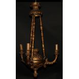 An early 20th century Italian giltwood and gesso three branch electrolier, turned lotus carved