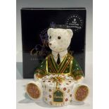 A Royal Crown Derby Teddy Bear paperweight, “A gift from Harrods”, specially commissioned for