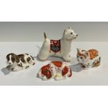 A Royal Crown Derby paperweight, West Highland Terrier, gold stopper boxed; a Royal Crown Derby