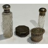 An octagonal silver patch box, marked 800; a silver topped scent; another pill box and scent (4)