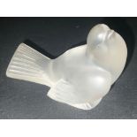 A Lalique frosted crystal glass model, wings closed, signed, 8.5cm high