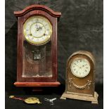 A French dome topped metal cased mantel clock, 23cm high; a Highland wall clock (2)