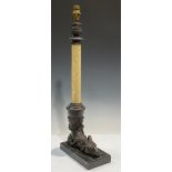 A Grand Tour type bronzed metal table lamp, cast wit the head of a mythical beast, rectangular