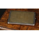 A Russian gold coloured metal overlaid silver rounded rectangular cigarette case, engine turned, 9.
