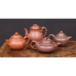 A Chinese Yixing teapot, moulded with blossoming prunus, 15cm high, seal mark; others (4)