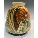 A Moorcroft ovoid vase, designed by Kerry Goodwin, tube lined with beavers in riverside habitat,