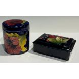 A Moorcroft Pomegranate pattern rectangular trinket box and cover, 12cm wide, impressed marks, HM