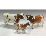 A set of three Beswick Ayreshire cattle models, Champion Whitehill Mandate bull, Champion Ickham