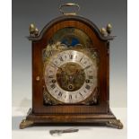 A George II style bracket clock, rolling moon phase to arch, 29.5cm high over handle