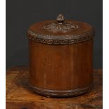 Treen - a 19th century cylindrical tobacco jar, the cover carved with an acanthus bud boss, Greek