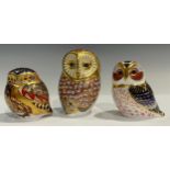 A Royal Crown Derby paperweight, Little Owl, gold stopper; others, Tawny Owl, gold stopper; Barn