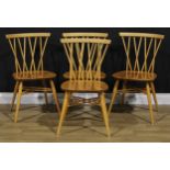 A set of four Ercol candlestick dining chairs, 79cm high, 46cm wide, the seat 41.5cm wide and 34cm
