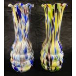 A pair of Murano glass cylindrical ribbed, flared vases, speckled in shades of blue, purple,