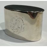 A late 19th century silver plated oval snuff box, hinged cover, monogrammed, the base engraved