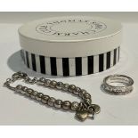 A Thomas Sabo 95 silver charm bracelet; a Tiffany 925 silver ring