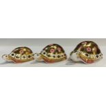 A set of three Royal Crown Derby paperweights, Yorkshire Rose Tortoise Family, Mother, Father and
