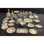 A quantity of Wedgwood green jasperware including vases, preserve jar and cover, comport,
