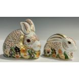 An associated pair of Royal Crown Derby paperweights, Rowsley Rabbit, specially commissioned by John