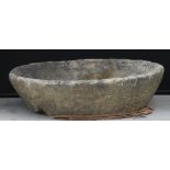 A gritstone shallow garden bowl planter, 21cm high, 84cm diameter