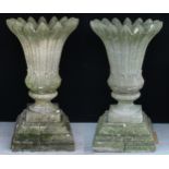A pair of concrete tulip-form Winslow type garden vases, 106.5cm high overall, the top 62.5cm