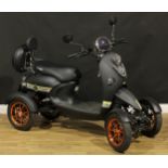 A GreenPower Unique-4 mobility scooter