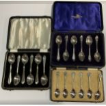 A set of six silver teaspoons, Sheffield 1929, cased; another, Birmingham 1960; a set of six