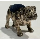 A sterling silver novelty miniature pincushion, modelled as a bulldog, 3.5cm wide, marked 925