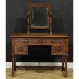 A 17th century inspired oak dressing table, 135cm high, 107cm wide, 49cm deep