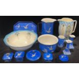 A Green & Co. Ltd, Church Gresley wash jug, dressing table set and chamber pot, including pair of