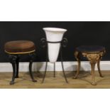 A cast iron-legged stool, 48cm high, 39cm diameter; another, 38.5cm high, 34cm diameter; a