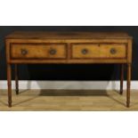 An oak low dresser or serving table, rectangular top with reeded edge above a pair of mahogany