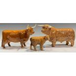 A Beswick Highland Cattle group, bull, cow and calf, printed marks (3)