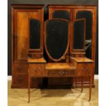 An early 20th century mahogany three-piece bedroom suite, comprising wardrobe, 198cm high, 117cm