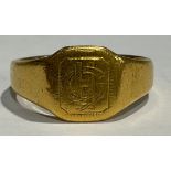 A 22ct gold signet ring, size N, monogrammed, marked "M.Bros" 22ct, 6.9g
