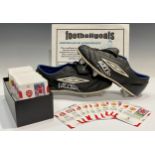 Football Interest - a pair of Umbro football boots, each signed in silver by Michael Owen; Panini