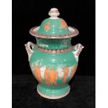 Etruscan revival - a two handled amphora and cover in Green with Classical figures and permeates,