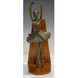 A bronze sculpture, of a ballerina, on wooden stand, 27cm high