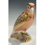 A Royal Crown Derby paperweight, Cockatoo, limited edition 32/2500, red printed marks, gold stopper,