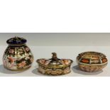 A Royal Crown Derby Imari 6299 pattern compressed ovoid pot-pourri vase and cover, 9cm, year