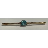 A 15ct gold bar brooch, set with a single faceted aquamarine stone, 5.75, 4g