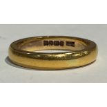 A 22ct gold wedding band, ring size L, 5.7g