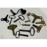 A collection of thirteen bracket and longcase clock keys