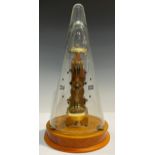 A Franz Hermle brass skeleton clock, striking on a bell, conical glass case, printed with Roman