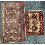 An antique Oriental rug, 162.5cm x 93cm; another, 99cm x 68cm (2)