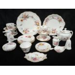 A Royal Crown Derby posie pattern plate, side plates, tea cups and saucers, teapot etc (qty)