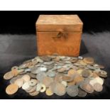 A box of coins, 19th and 20th century European and other denominations, base metal.