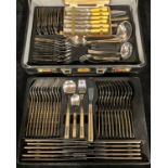 A set of Prima stainless steel flatware for twelve, including soup ladle, cake slicer, salad