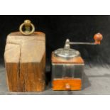 A treen section door stop, brass loop handle, 26cm high; a French Peugeot Freres coffee grinder (2)